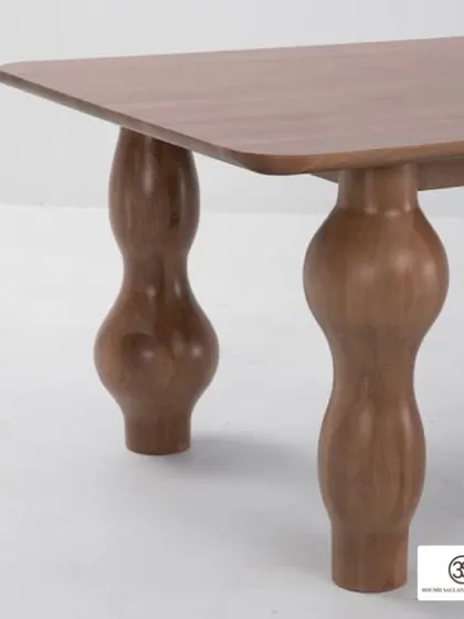 This custom dining table features beautifully turned, bulbous legs that give it a classic yet contemporary feel. It's a perfect example of how I reinterpret traditional forms for modern homes.