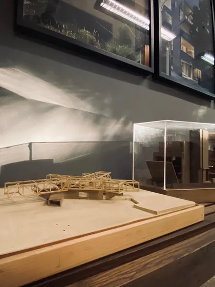 Physical architectural models in my studio. The play of winter sunlight on the wall behind the models serves as inspiration for how light will interact with the final building.