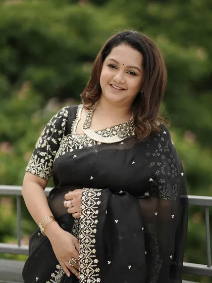 Another portrait of the same client, capturing her graceful and sophisticated look.