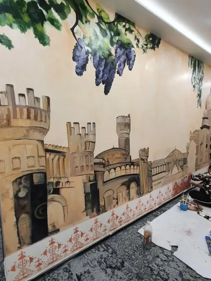 Here's my team member working on the Bengaluru cityscape mural at Prestige Techno-Star. Every project is a team effort.