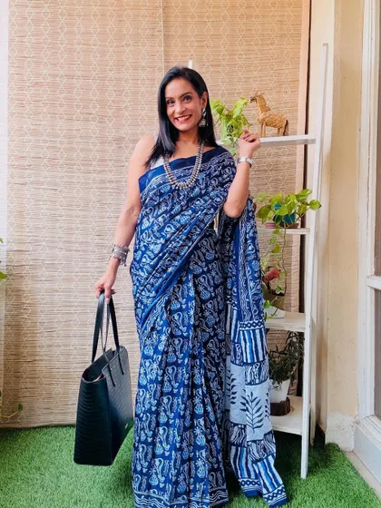 This indigo blue block print style pre-stitched saree is a timeless classic. It's a versatile piece that you can wear to work or for a casual day out.