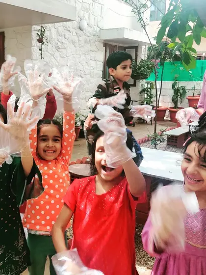 Children show off their gloves after a clean-up drive around our school, a simple act of civic responsibility to celebrate Independence Day.