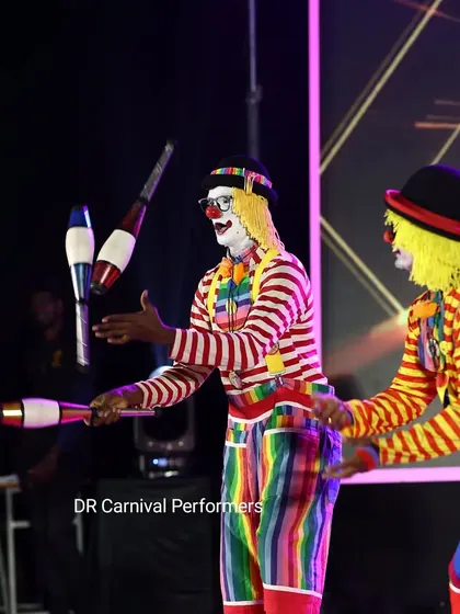 Our clown juggling duo in action on stage. This coordinated act is a fantastic highlight for any event, showcasing teamwork, skill, and a whole lot of comedy.