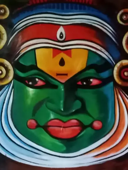 This is a vibrant acrylic painting of a Kathakali mask, a powerful symbol of Indian classical performance art. I focused on the intense colors and dramatic expression to capture the character's divine and heroic essence, making it a striking piece of cultural art.