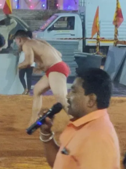 The intensity of the match is captured as the announcer details the action.