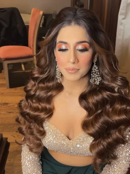 A true princess look with full, flowing waves. I use my extensions to build this kind of fairytale volume that looks both soft and dramatic.