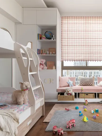 To maximize floor space in the kids' room, I designed a custom bunk bed. This solution provides each child with their own cozy corner while leaving plenty of room for play, demonstrating my focus on smart, family-friendly space planning.