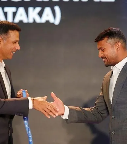 A handshake that signifies respect and the passing of a legacy. Rahul Dravid presenting an award to Mayank Agarwal.