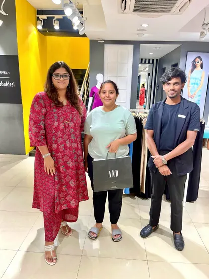 Connecting with customers is the best part of my job. Here's a moment with a happy shopper during the Global Desi and AND styling event.