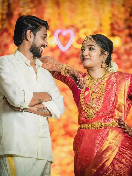 A fun, candid shot. The groom's look is versatile enough for both formal portraits and relaxed, happy moments.