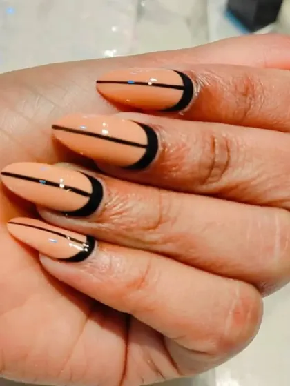 A minimalist and modern design with clean, black geometric lines on a neutral peach-colored base.