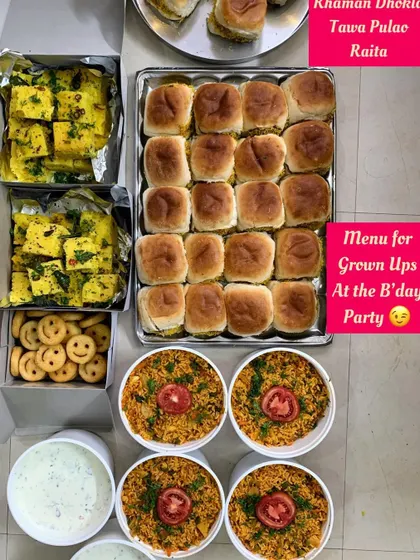 Another view of the adult's menu at a birthday party, with smiley fries for a touch of fun.