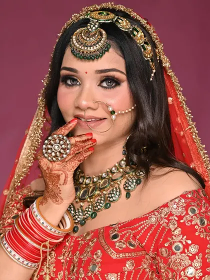 A full view of the modern bridal makeup. Her confidence shines through with this bold eye makeup and perfectly defined features, ready for her big day.