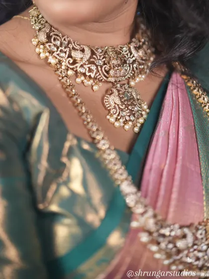 Unique caption for media id 136 describing the specific jewellery and look.