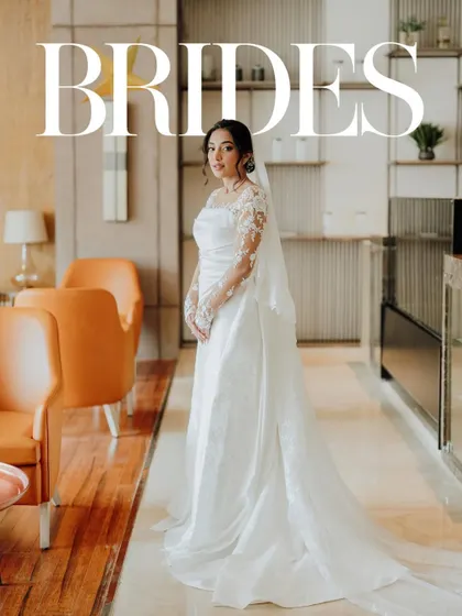 A bridal portrait with an editorial feel. The clean lines of the hotel lobby and the elegance of the bride's gown come together to create a stunning, magazine-style shot.