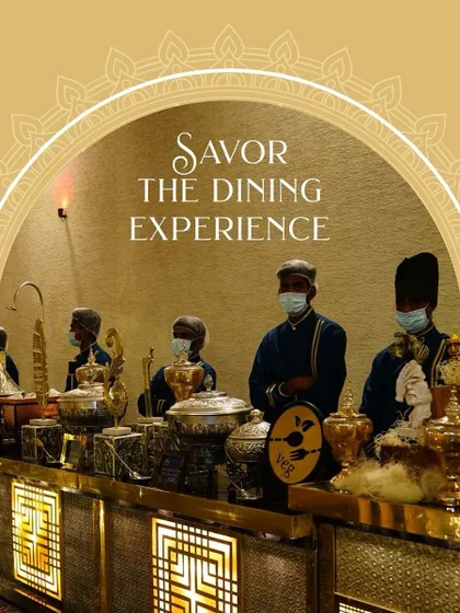 A glimpse of the royal dining experience I strive to create. My team, dressed in traditional attire, serves guests from ornate silver chafing dishes, ensuring every detail feels special.