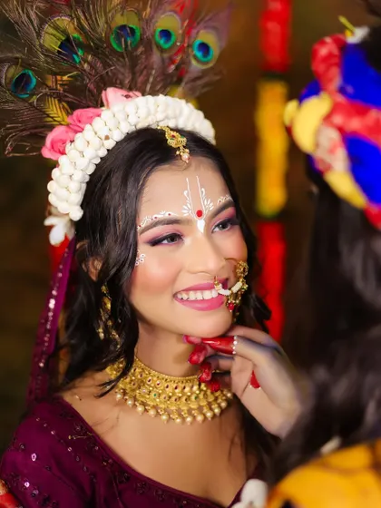 A joyful and radiant portrait of Radha, with a focus on her expressive smile and sparkling eyes.