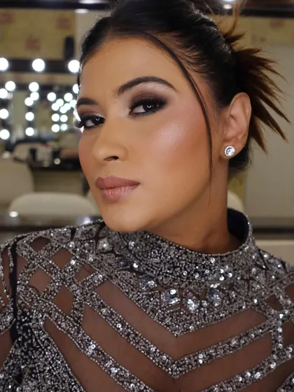 Another close-up in different lighting, showing how the smokey eye and contoured skin look flawless and camera-ready.