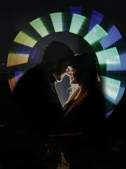 We love getting creative after the sun goes down. This light painting portrait is an example of how we use artistic techniques to create a truly unique and magical image that sets your pre-wedding shoot apart.