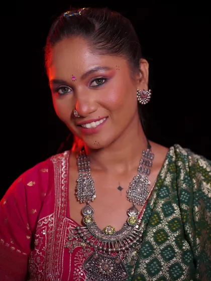 A close-up of the Navratri glam, showing the bright eye makeup and flawless base.