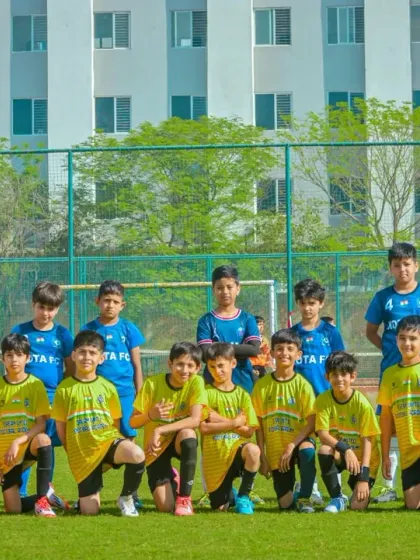 A full squad photo of a youth team before their big match.