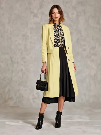 This 'Modern Maverick' concept showcases a pale yellow longline blazer with a geometric print blouse and a black midi skirt. It demonstrates how I can layer different pieces in AI to create a fully styled, cohesive outfit.