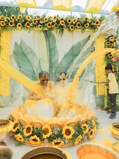 A Haldi ceremony is all about joy and vibrant moments. We love creating fun, interactive setups like this one, complete with traditional elements and plenty of room for playful splashing, ensuring your photos are as lively as the celebration itself.