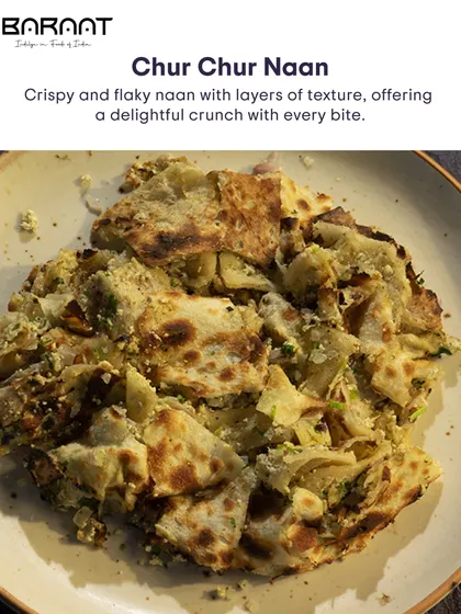 Our Chur Chur Naan is a crispy and flaky bread with layers of texture, offering a delightful crunch with every bite.