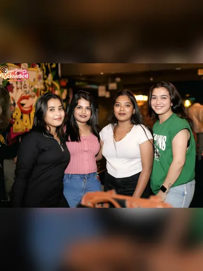 Guests posing for a photo at Sugar Factory. It's not just about the dancing, it's about the whole social experience.
