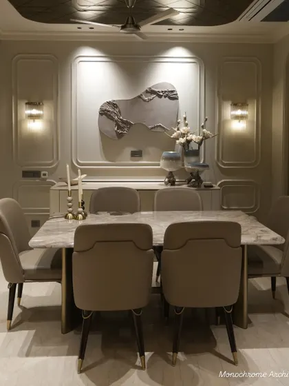 The dining area is the heart of many homes. For this space, we designed a bespoke dining table with a specially sourced Italian marble top. The chairs are fabricated with a practical leatherette front and a beautiful weave texture at the back, combining easy maintenance with elegant design.