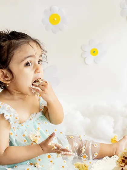 This little girl had a love-hate relationship with her cake, which made for some hilarious and adorable expressions. Her daisy-themed cake smash was so much fun to shoot.