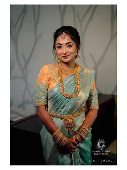Another beautiful portrait of Harshitha. The makeup is timeless and elegant, a perfect example of a classic South Indian engagement look that will never go out of style.