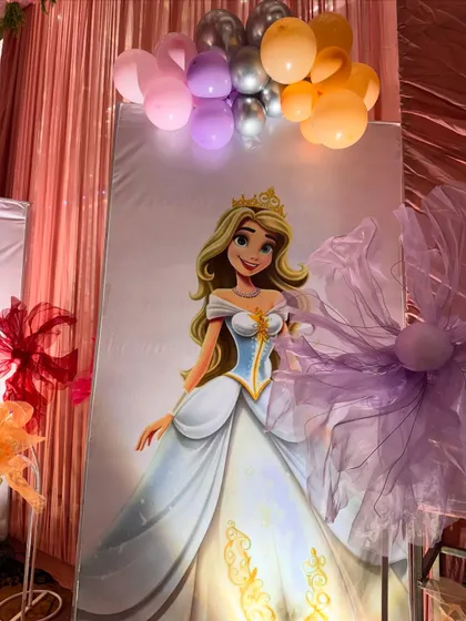 A lovely princess character standee, illuminated from below, adds a touch of magic to the decor.