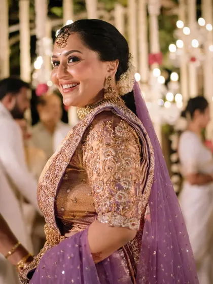The bride's radiant smile captured during her wedding reception.