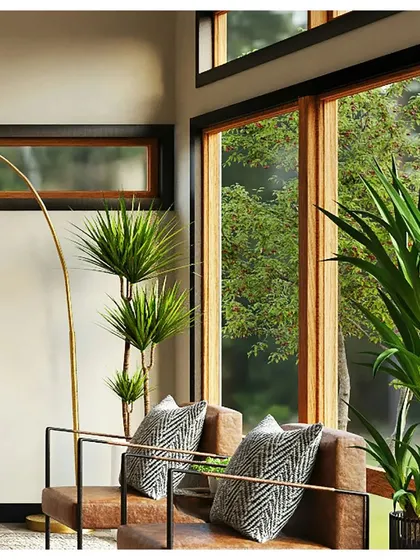 This image captures the essence of our "Wellness by Design" philosophy, using natural light, plants, and earthy materials to create a home environment that promotes well-being.