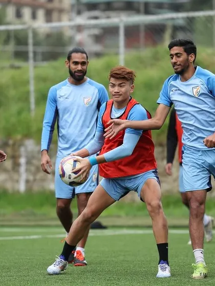 Leading the team in a training drill in Bhutan. My role is to ensure that every player is engaged, focused, and working towards our collective goal.