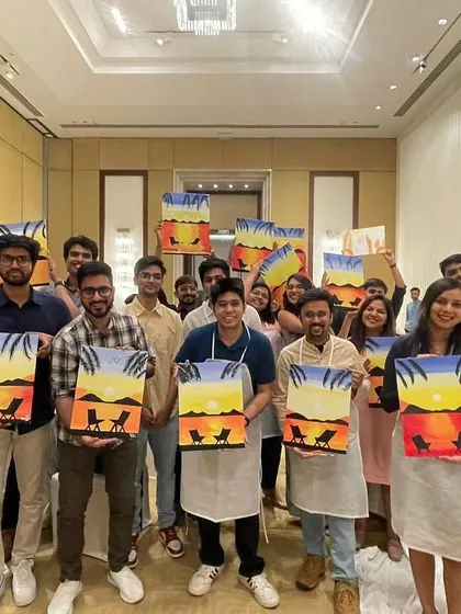 Another group of proud painters from a multi-city corporate event. Seeing teams hold up their finished work together is the best part of my job.