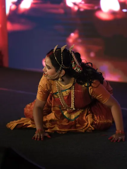A duplicate shot showing the detailed hair work for the Draupadi character. The traditional braid and hair ornaments are essential to the overall authenticity of the performance look.