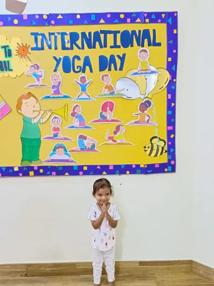 A happy little girl in her prayer pose for International Yoga Day. Our celebrations are always inclusive and full of positive energy.