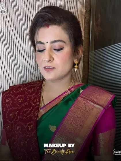A close-up showing the subtle eye makeup and the flawless base that looks natural and radiant.