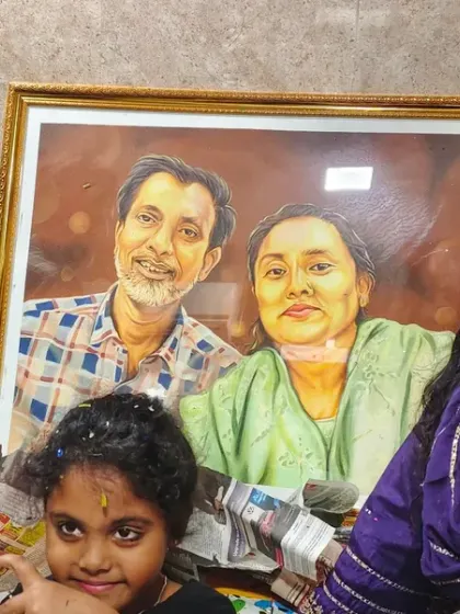A family celebrating with their new custom couple's portrait. I painted this piece in acrylics as a special anniversary gift.