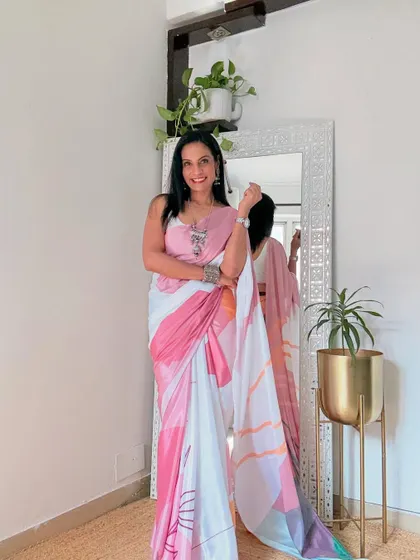 A beautiful multi-color printed crepe saree. The abstract design is very modern and artistic. This is a great saree for making a style statement.