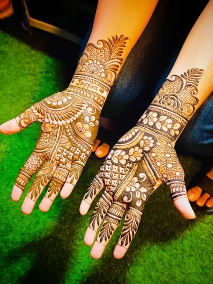 An angled view of the 'Jaffer' mehandi, showing the floral and paisley elements.