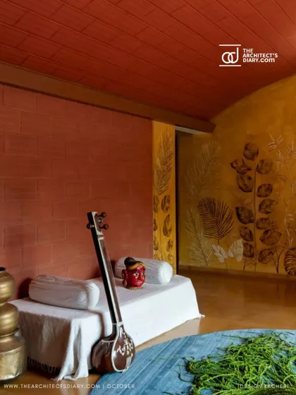 The interplay of textures is central to my work. Here, the smooth yellow oxide wall with leaf imprints meets the rich red of the terracotta brick.