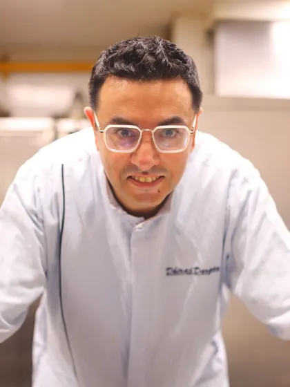 A portrait of our Brand Chef, Dhiraj Dargan, the culinary mind behind the Comorin menu.