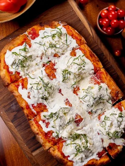 Our Burrata Alla Pala pizza, an extra fluffy and satisfying option available at our Ghitorni outlet.