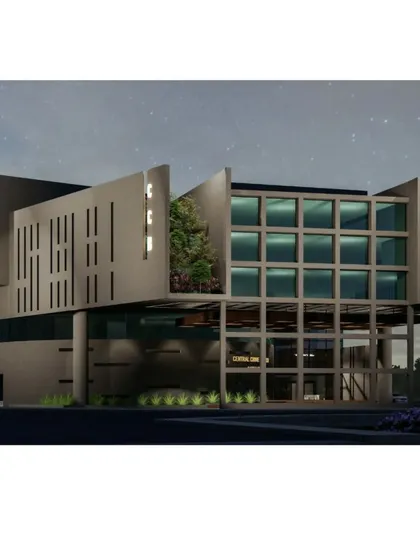 A night view render of the Bangalore Public Office. The lighting design highlights the building's unique architectural elements, including the cantilevered sections and the gridded glass facade, creating a dramatic presence after dark.