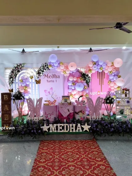 A wide shot of the venue with the butterfly theme.