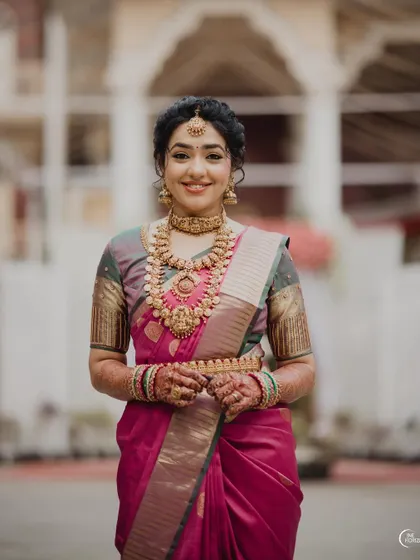 A happy, smiling portrait of the prettiest Anushya. Her natural beauty shines through the soft and elegant makeup.