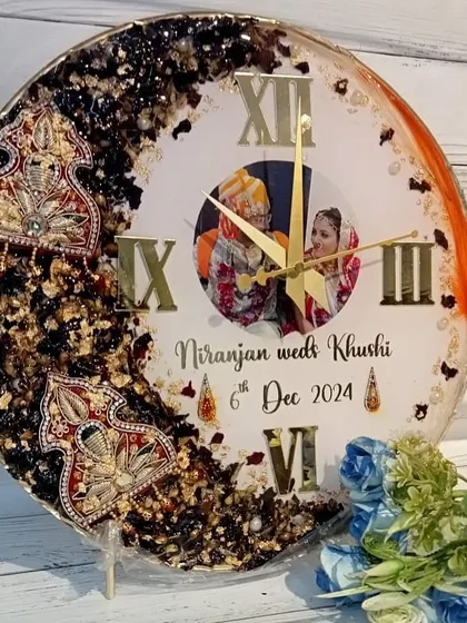 This unique clock preserves not just flowers, but also decorative elements from the groom's attire. The couple's photo is at the center, creating a truly personalized wedding keepsake.